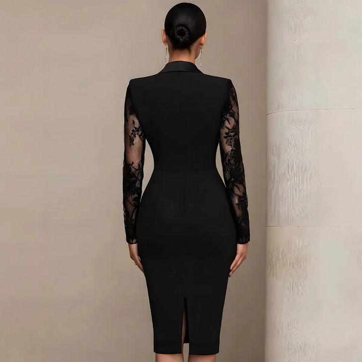 Black blazer-style bodycon dress, back view showing hem slit