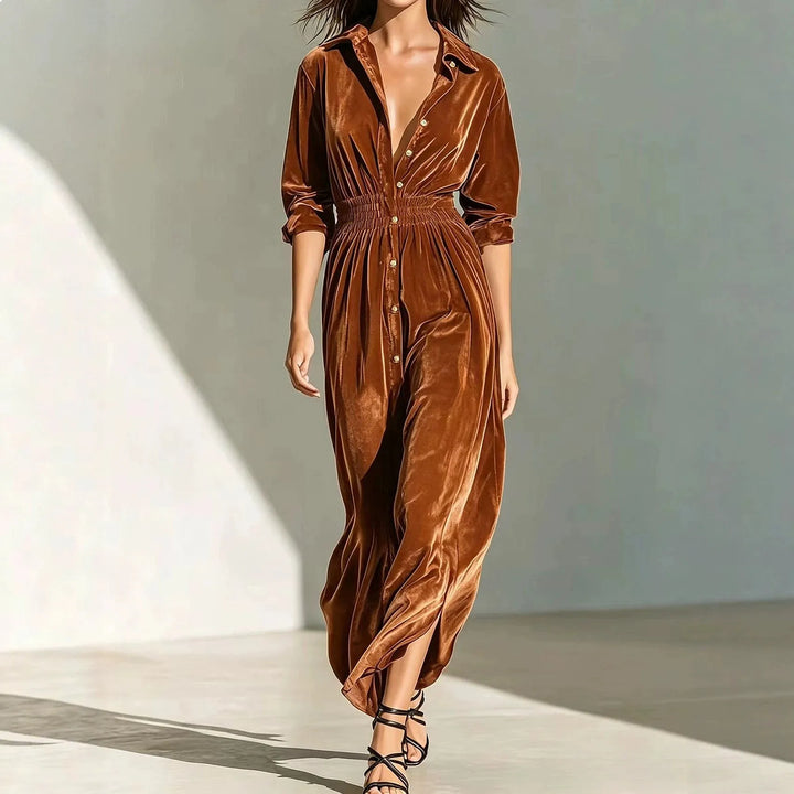 Rust velvet shirt dress with button front, walking shot