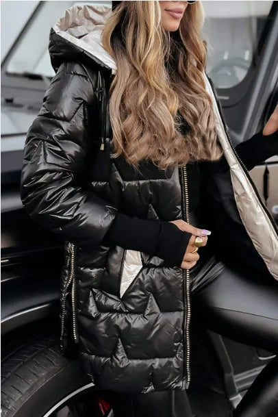 Side view of black quilted puffer jacket with hood