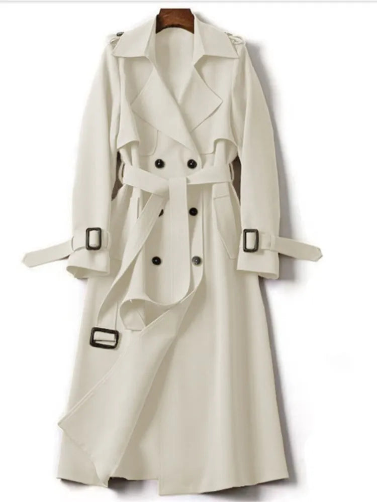 White belted trench coat on hanger, front view