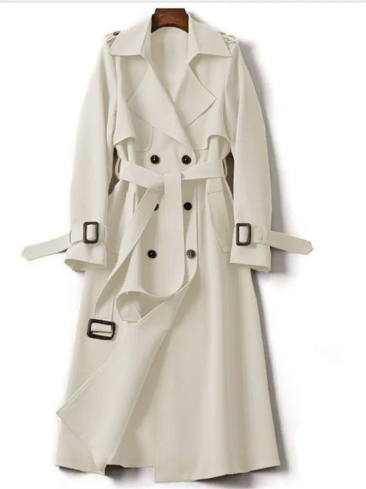 White belted trench coat on hanger, front view