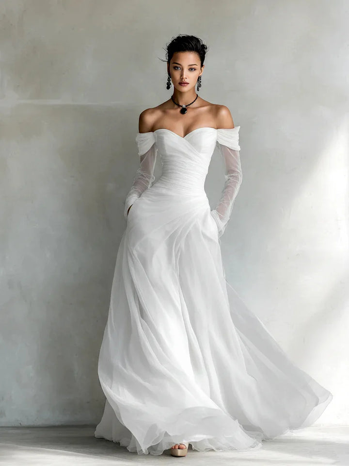White off shoulder evening gown with sheer sleeves, full length