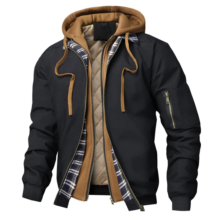Black hooded bomber jacket with tan hood and plaid trim, front view
