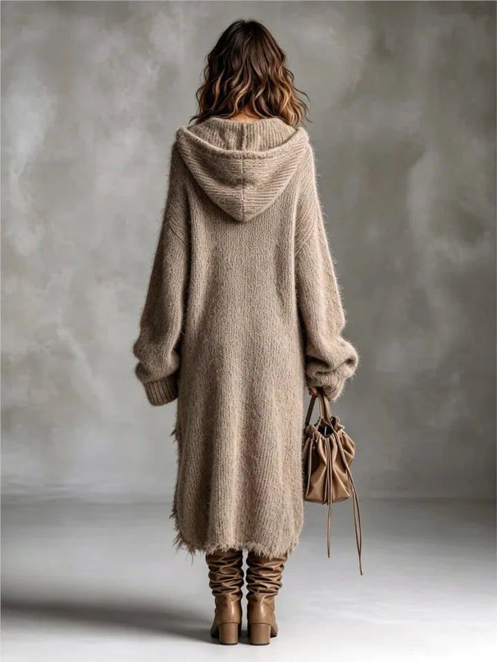 Khaki hooded sweater dress, back view showing hood and frayed hem