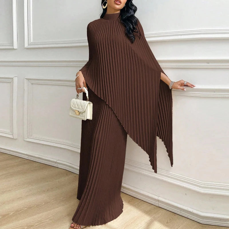 Woman wearing brown pleated cape top and wide leg pants two piece set