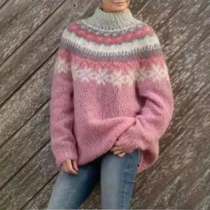 Woman wearing pink ombre fair isle turtleneck sweater