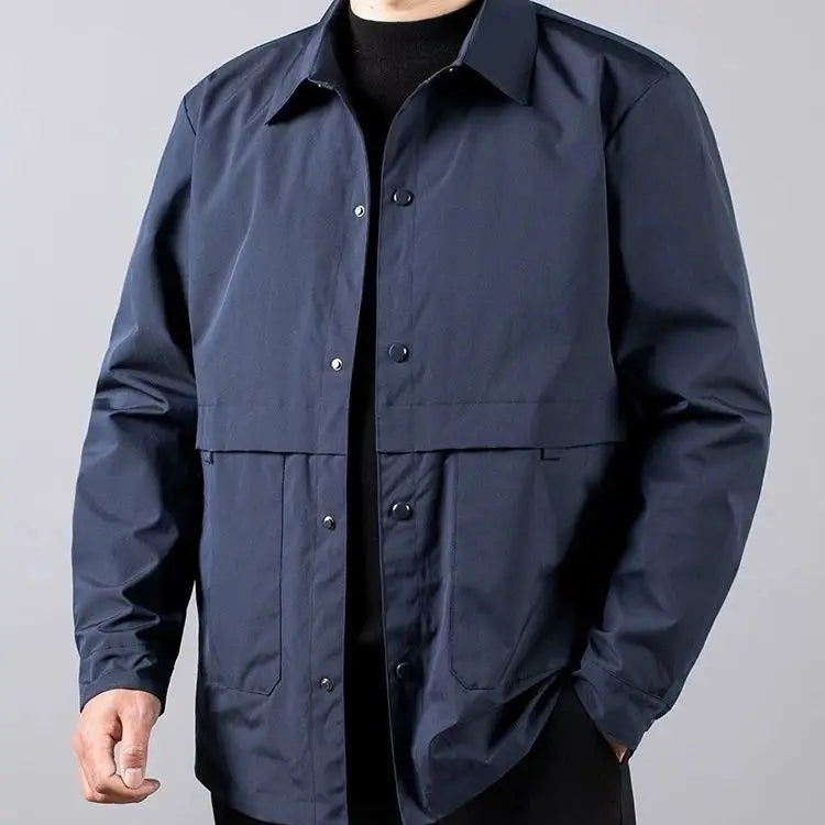 Man wearing navy blue shirt jacket, close front view