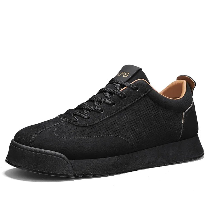 Angled view of black sneaker on white background