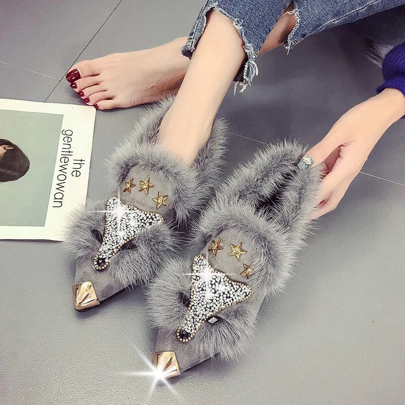Gray fur ankle boots with crystal fox applique, front view on model