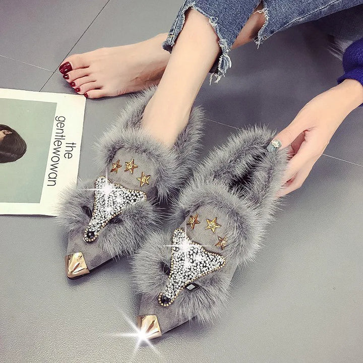 Gray fur ankle boots with crystal fox applique, front view on model