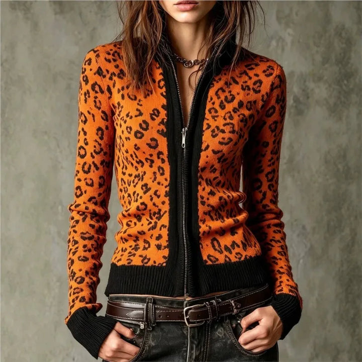 Orange leopard print zip front cardigan on model, front view