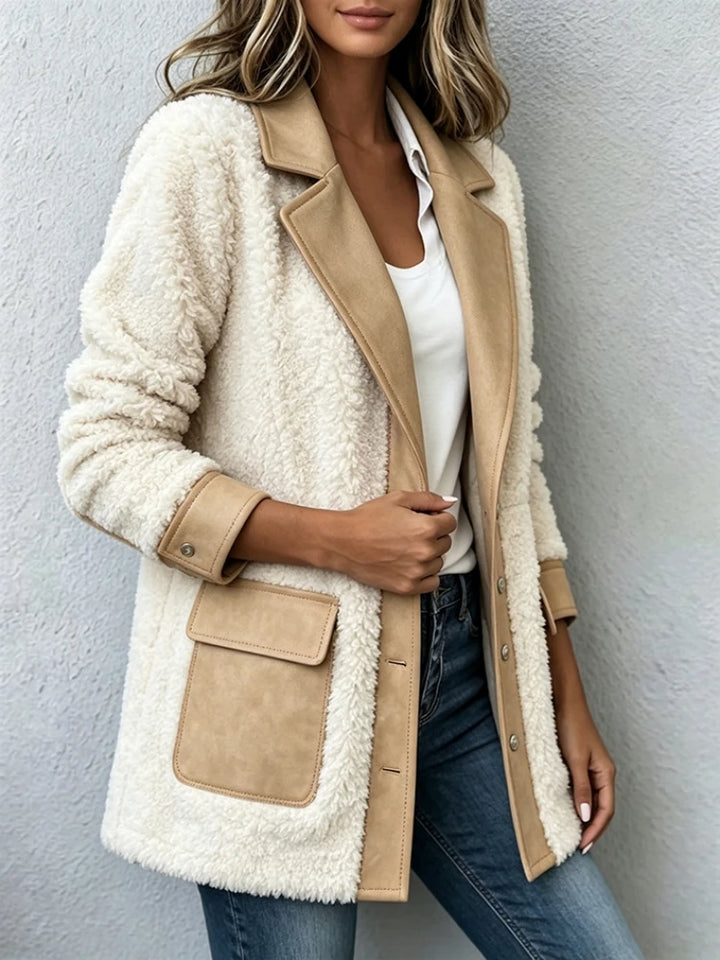 Close-up of khaki sherpa jacket collar and patch pocket detail