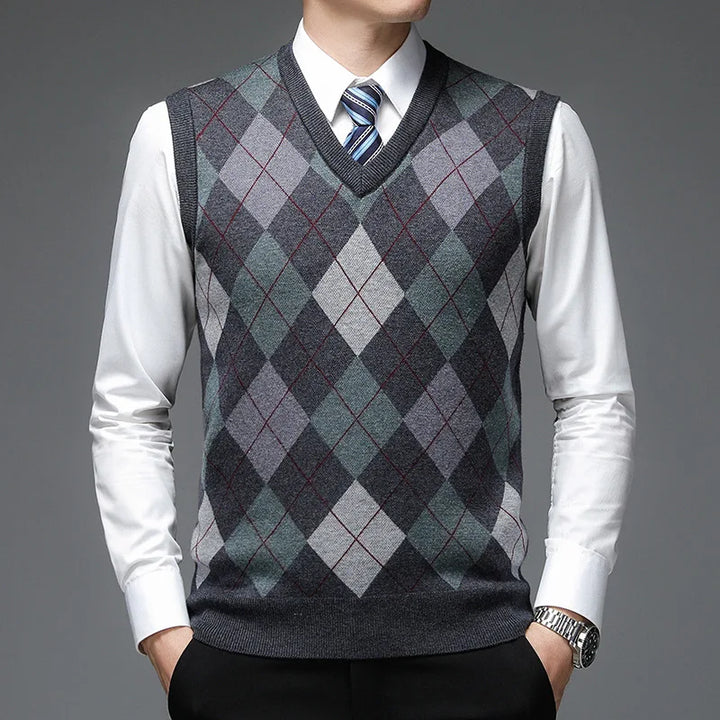 Man wearing dark gray argyle sweater vest close up