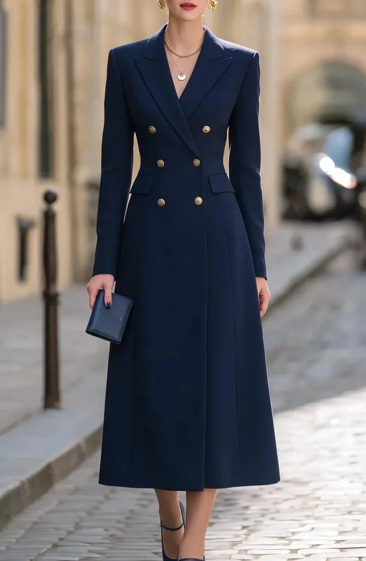 Woman wearing navy blue double breasted blazer midi dress on cobblestone street