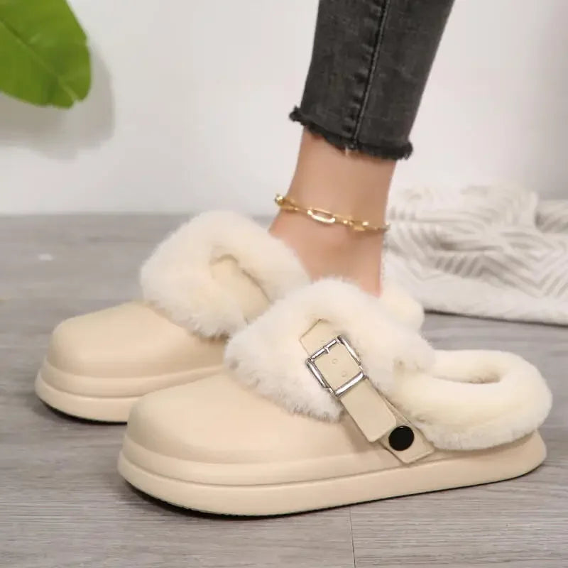 White faux fur platform clog slipper worn on foot, side view