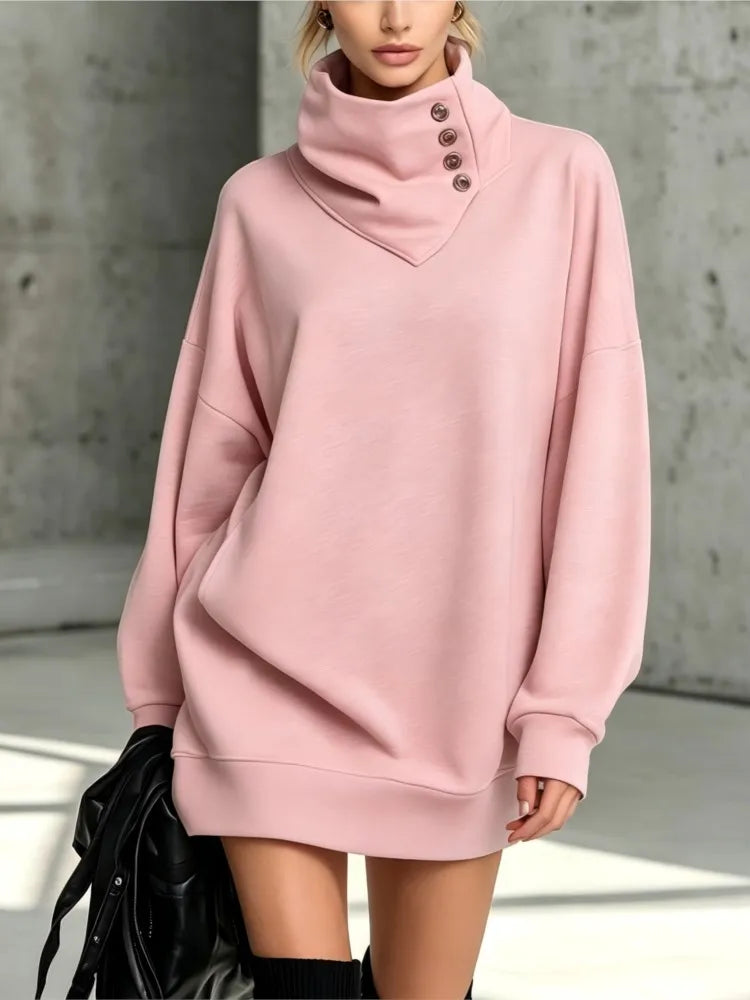 Pink sweatshirt dress with buttoned collar, close up view
