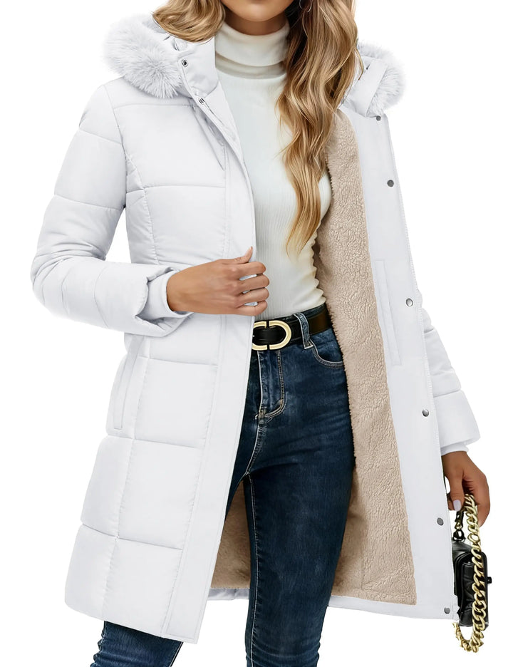 Close up of white quilted puffer coat with sherpa lining and fur hood