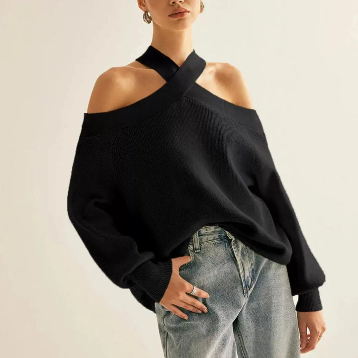 Front view of black halter neck cold shoulder sweater