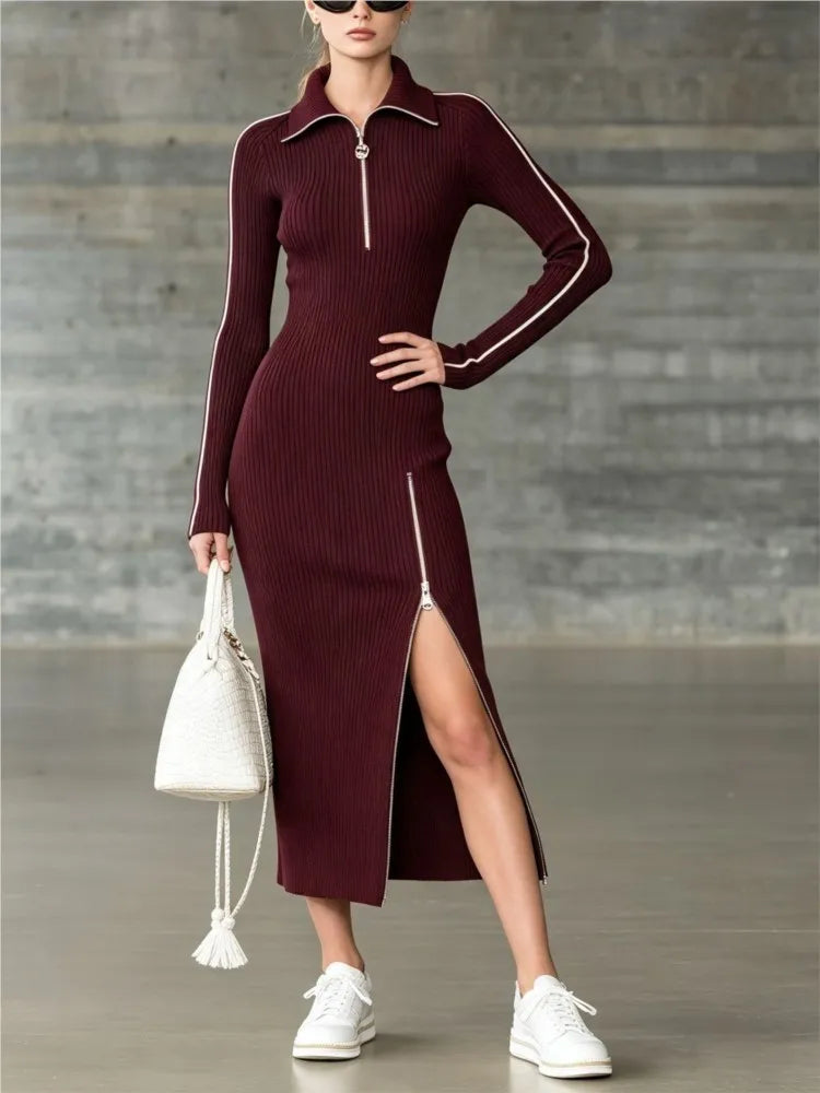 Burgundy ribbed knit sweater dress with side slit, standing pose