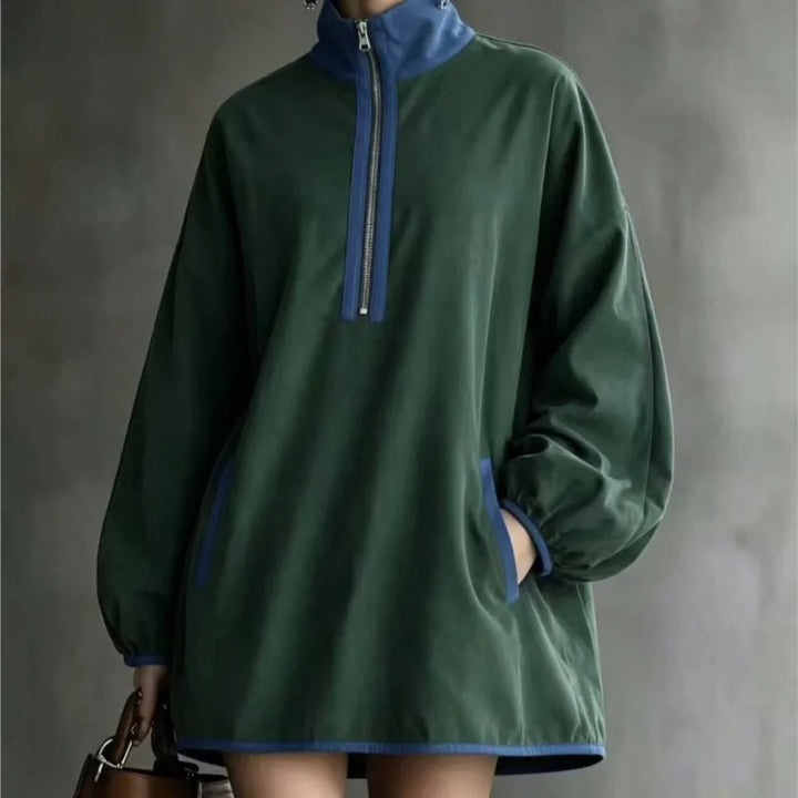 Green mini dress with blue contrast trim and half zip