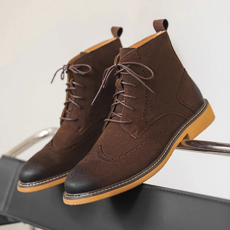 Brown faux suede wingtip brogue ankle boots on display