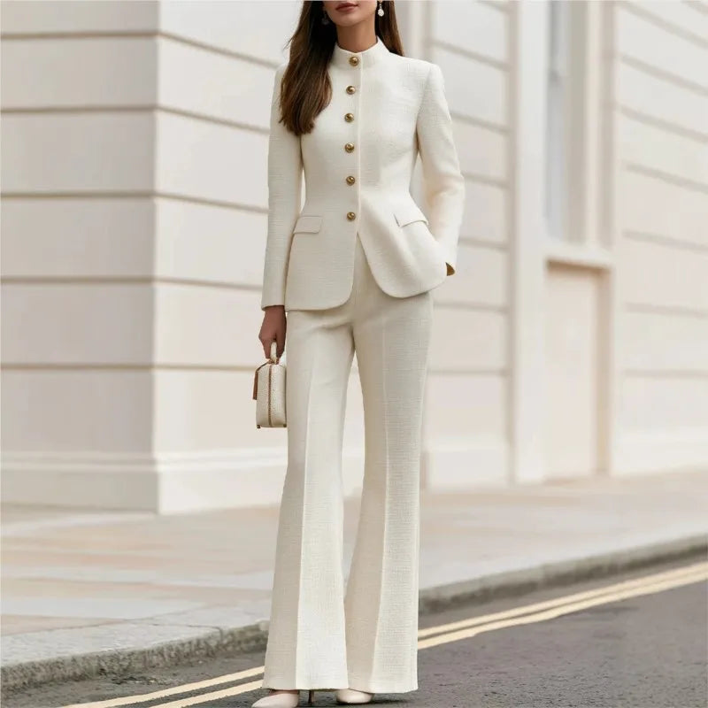 Woman wearing beige tweed stand collar blazer and flared trousers set