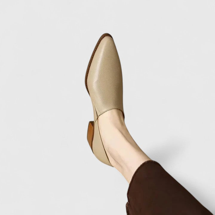 Apricot pointed-toe loafer shown from above on foot