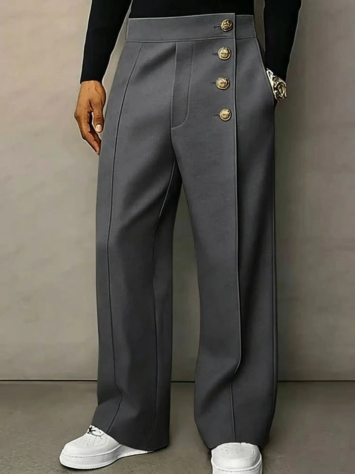 Dark grey high waist trousers with button front, worn front view