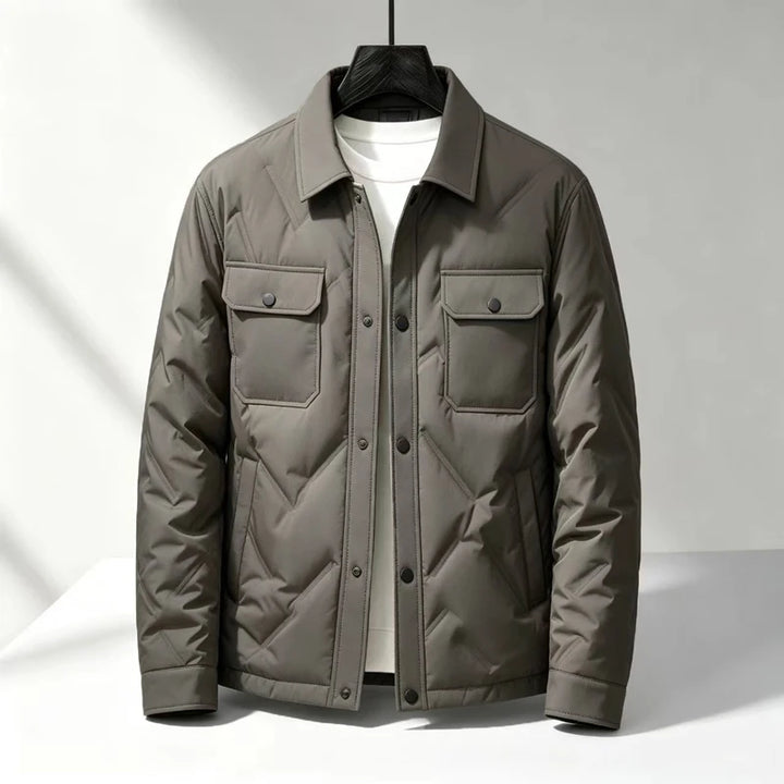 Gray quilted puffer jacket with flap chest pockets, front view