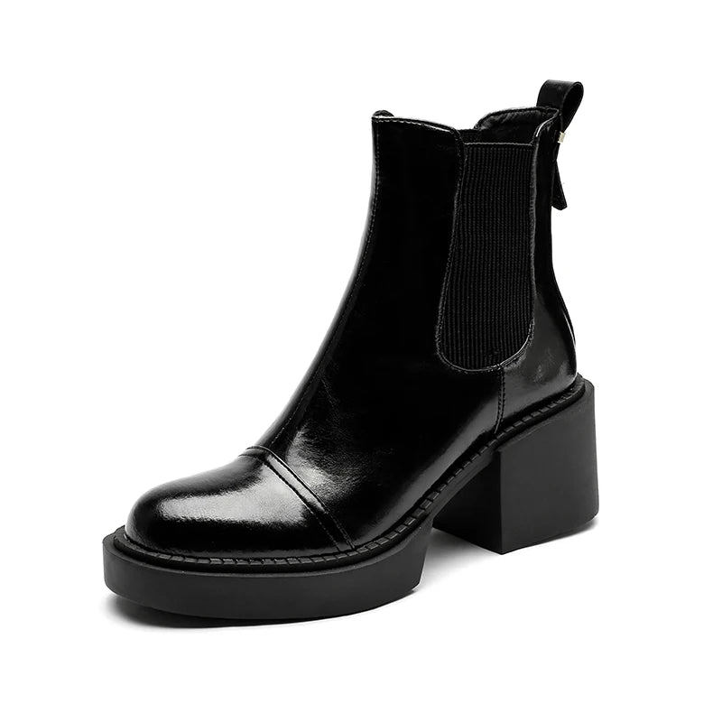 Black Chelsea boot with platform sole studio shot