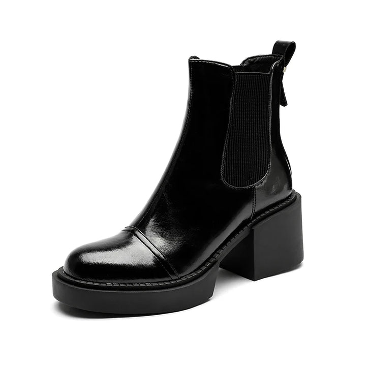 Black Chelsea boot with platform sole studio shot