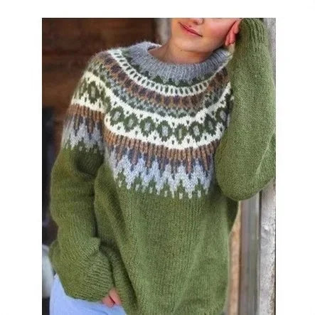 Woman wearing green fair isle sweater with geometric pattern