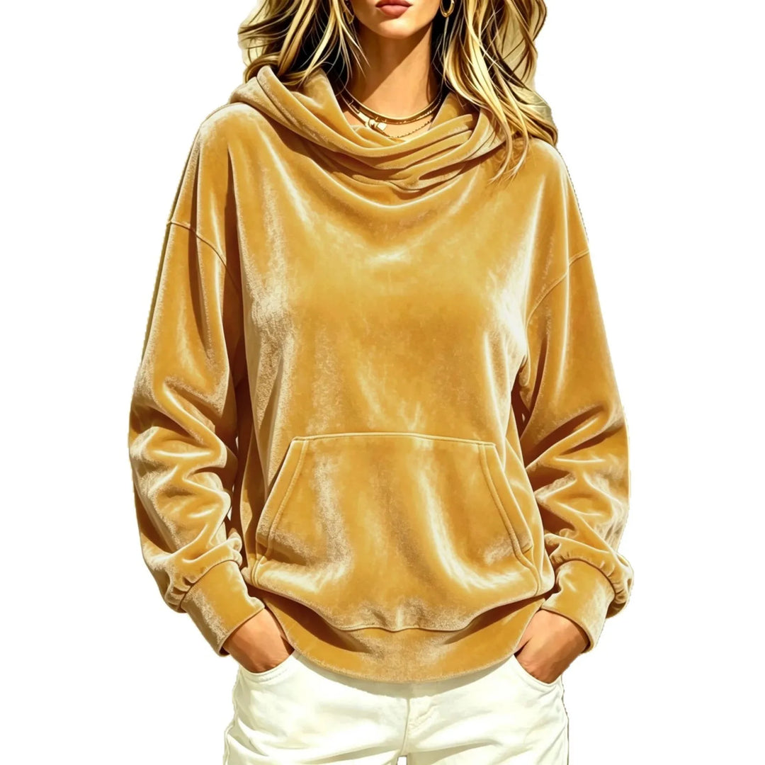 Woman wearing gold velour hoodie with cowl hood and kangaroo pocket