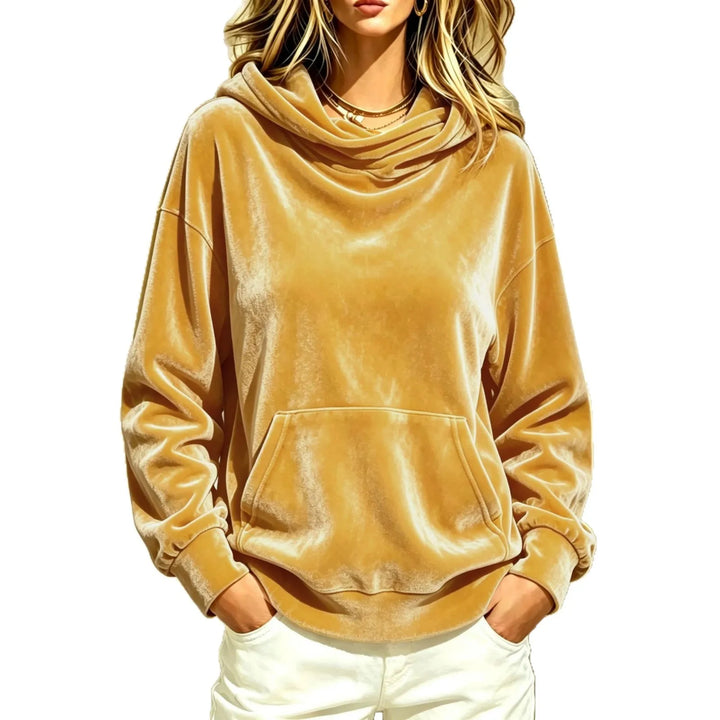 Woman wearing gold velour hoodie with cowl hood and kangaroo pocket