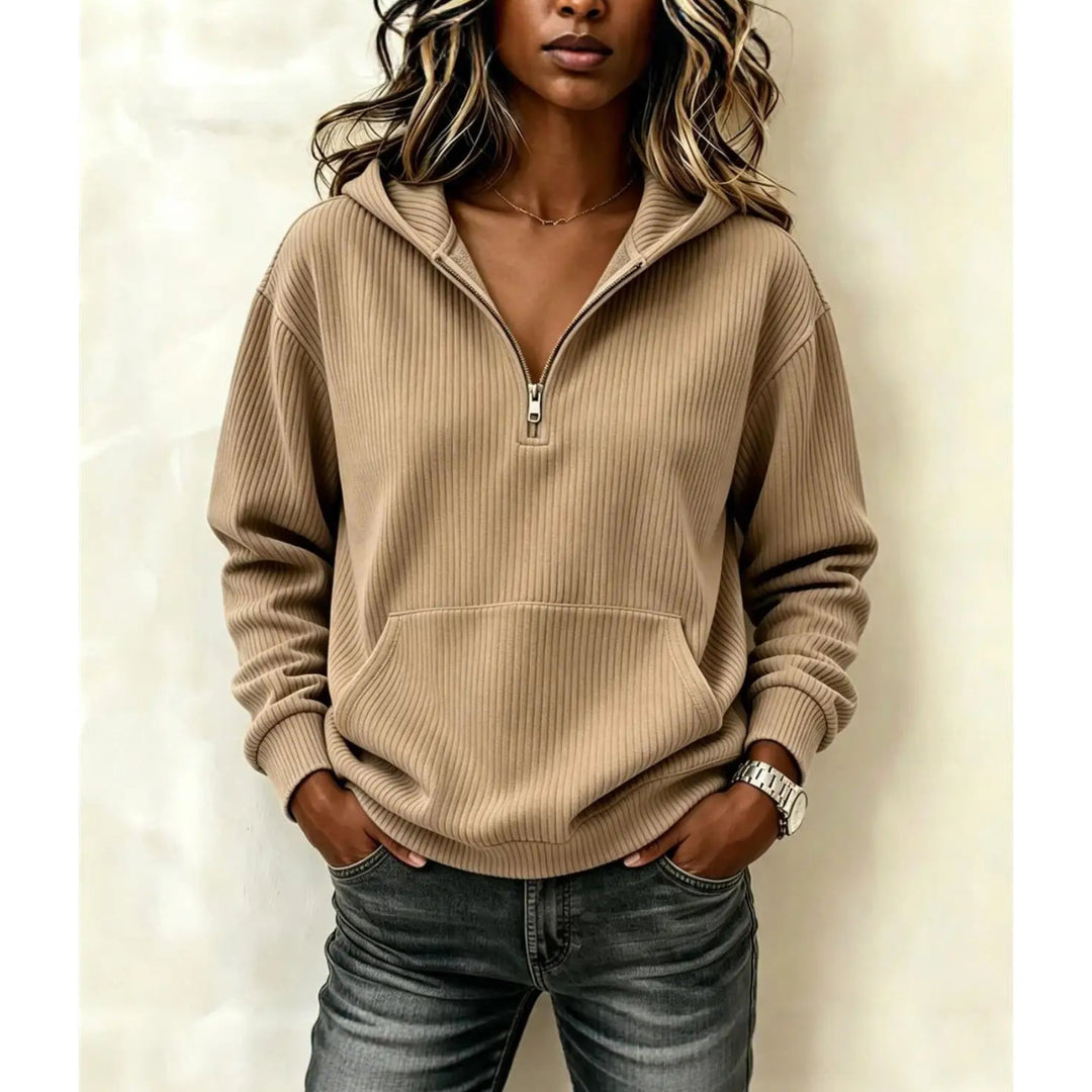 Woman wearing khaki ribbed half-zip hoodie with kangaroo pocket