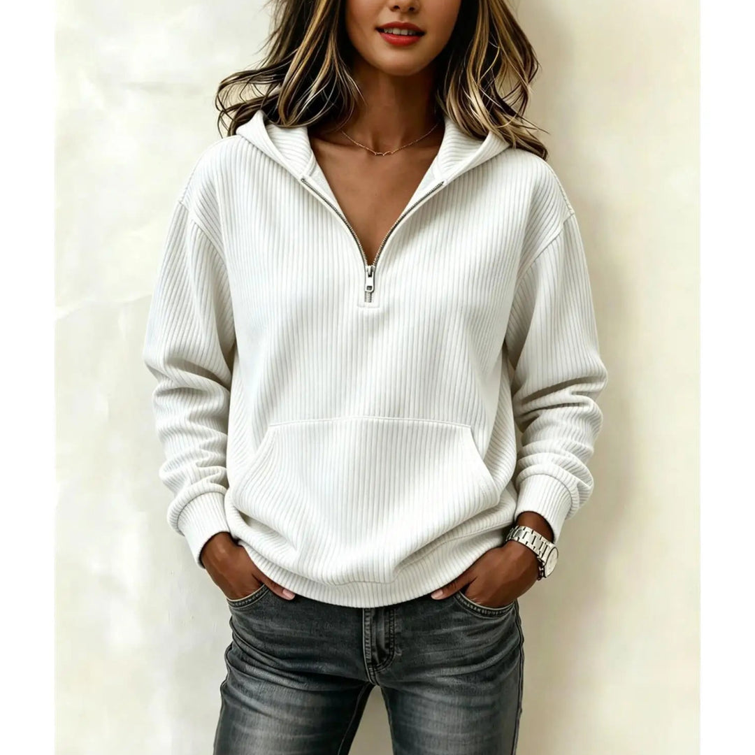 Woman wearing white ribbed half-zip hoodie with kangaroo pocket