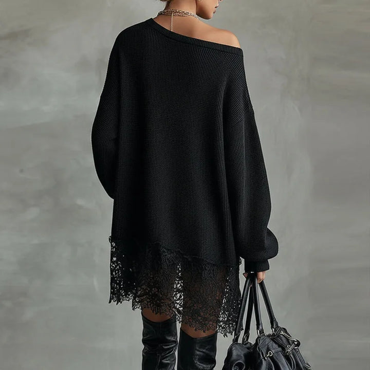 Back view of black off shoulder waffle knit sweater dress with lace hem