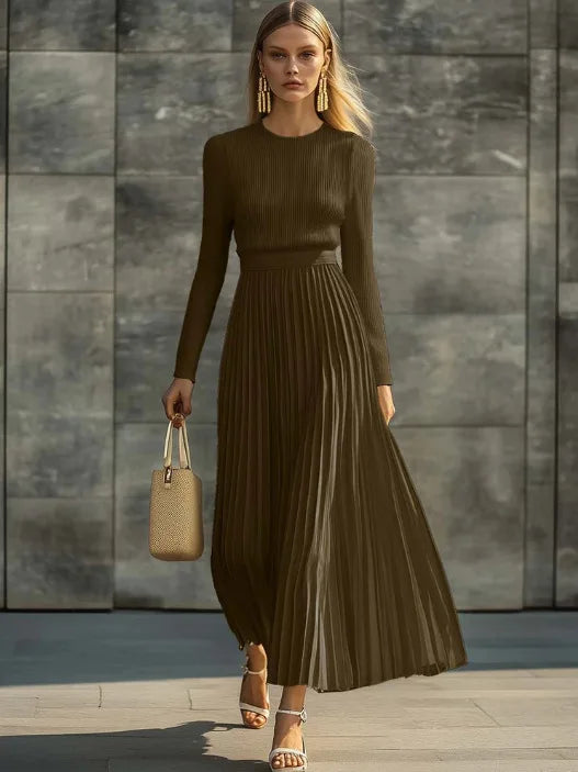 Woman wearing brown ribbed knit pleated maxi dress, front view