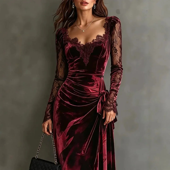 Close-up of dark red velvet dress lace neckline and sleeves