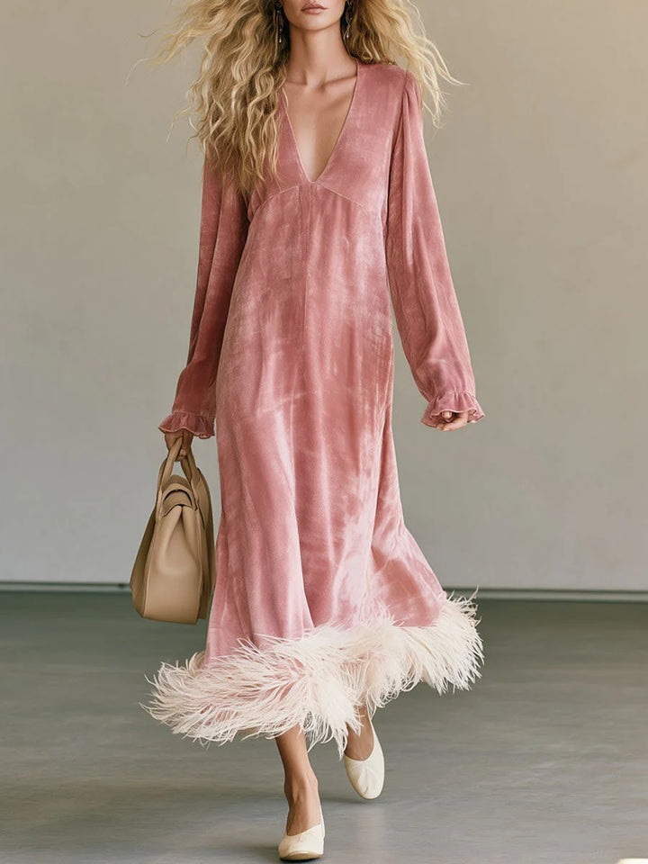 Pink velvet maxi dress with feather trim hem, front view