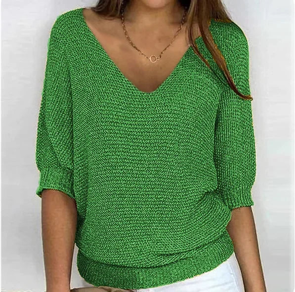 Green V-neck knit sweater with three-quarter sleeves