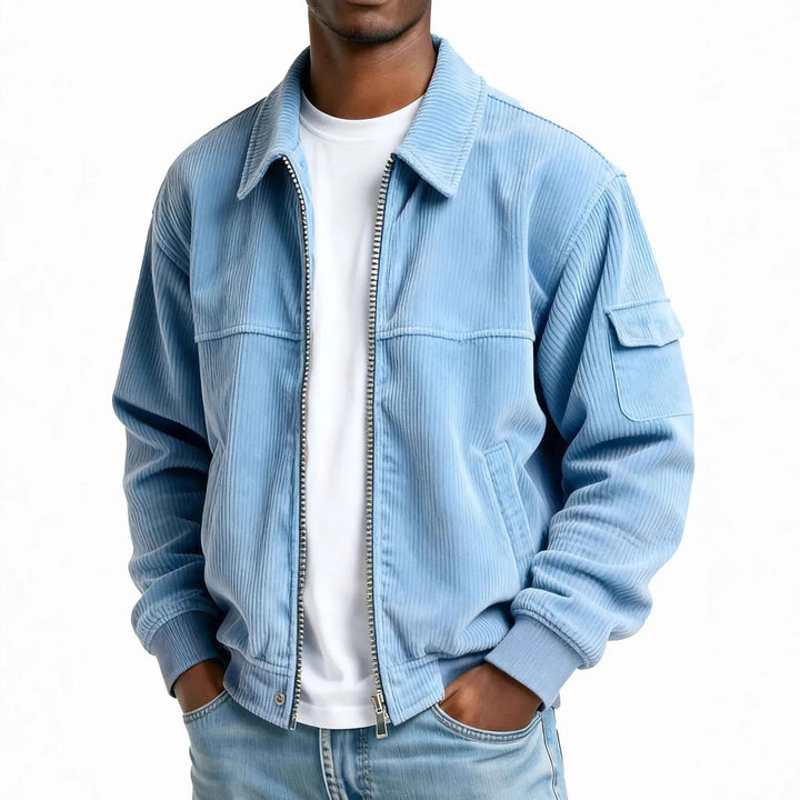 Man wearing light blue corduroy zip jacket with flap pocket
