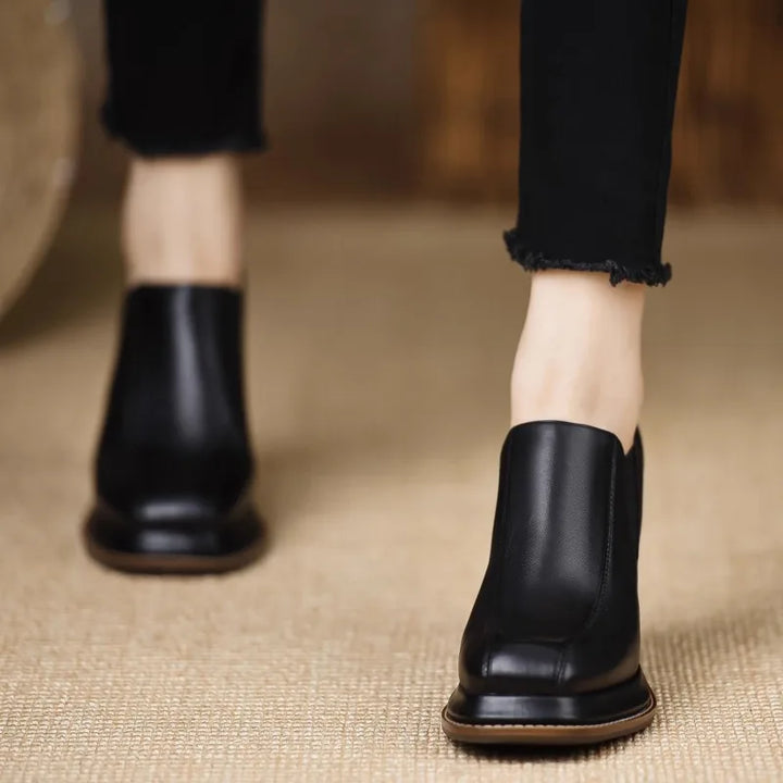 Black platform block heel pump front view