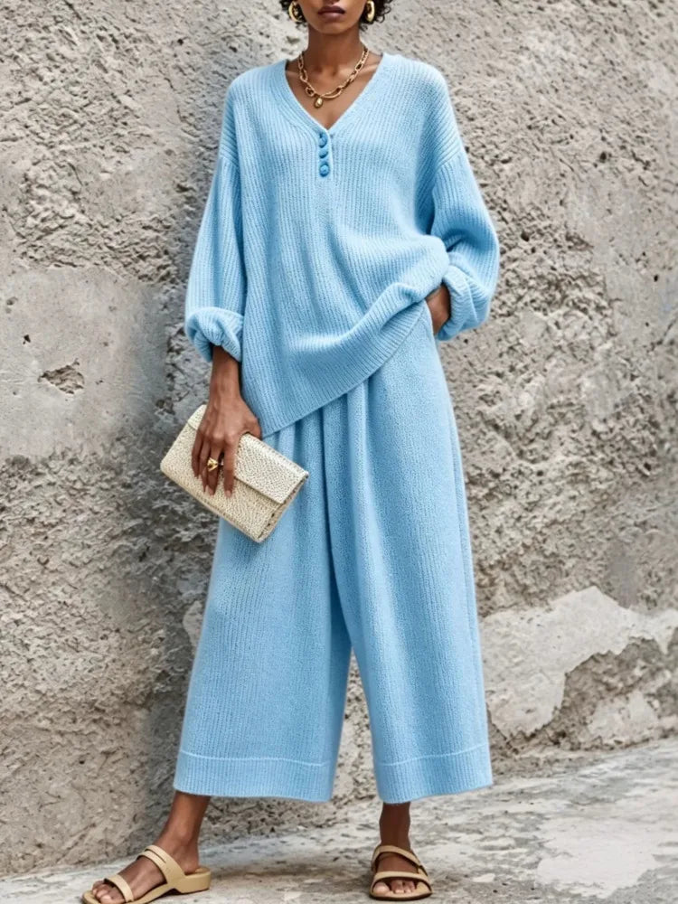 Woman wearing sky blue ribbed knit sweater and wide leg pants set