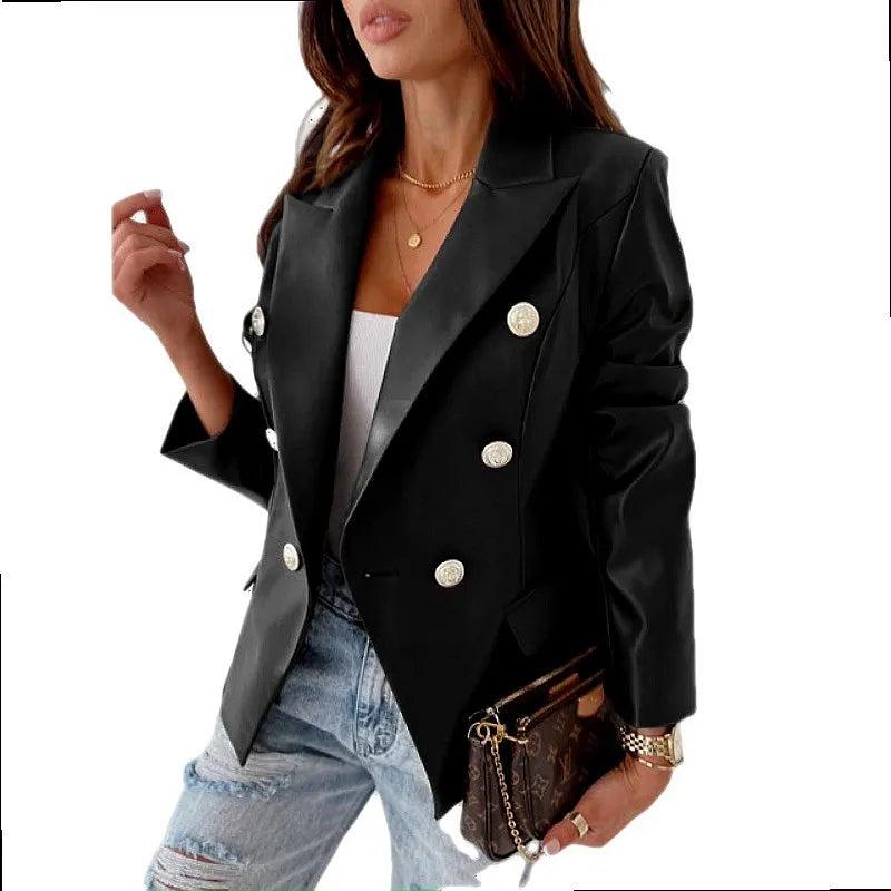 Woman wearing black faux leather double breasted blazer