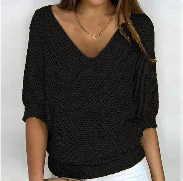 Black V-neck knit sweater with three-quarter sleeves