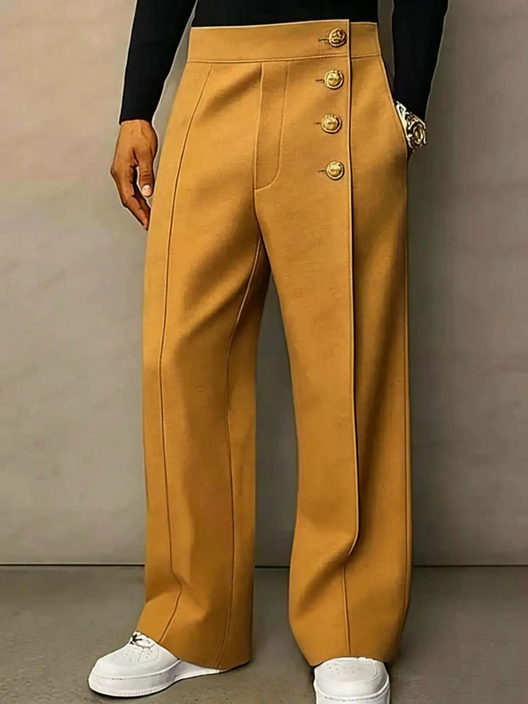 Turmeric wide leg trousers with gold button front, worn front view