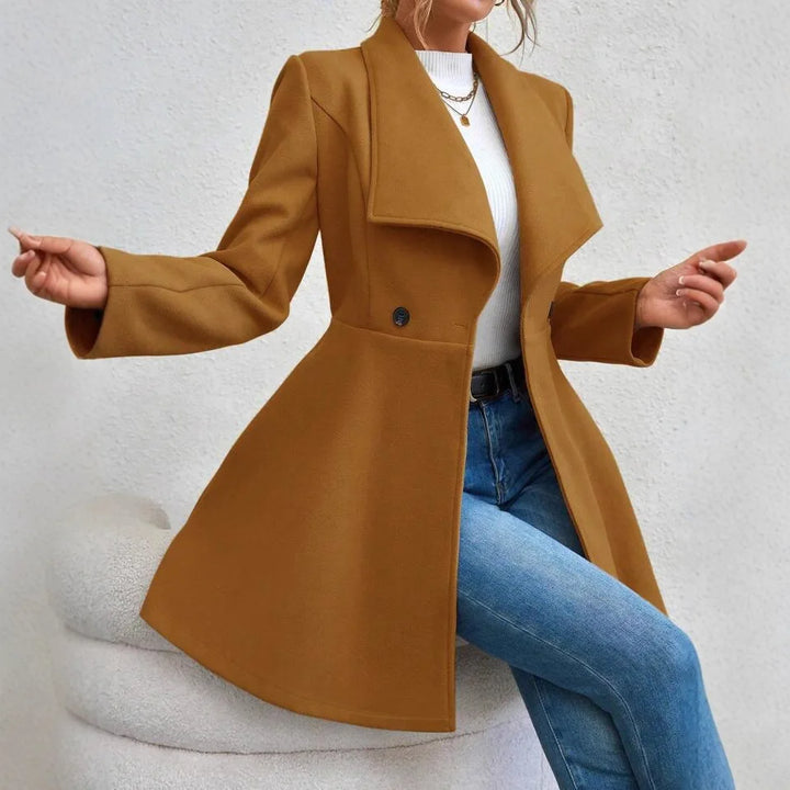 Woman wearing camel waterfall collar swing coat, side view