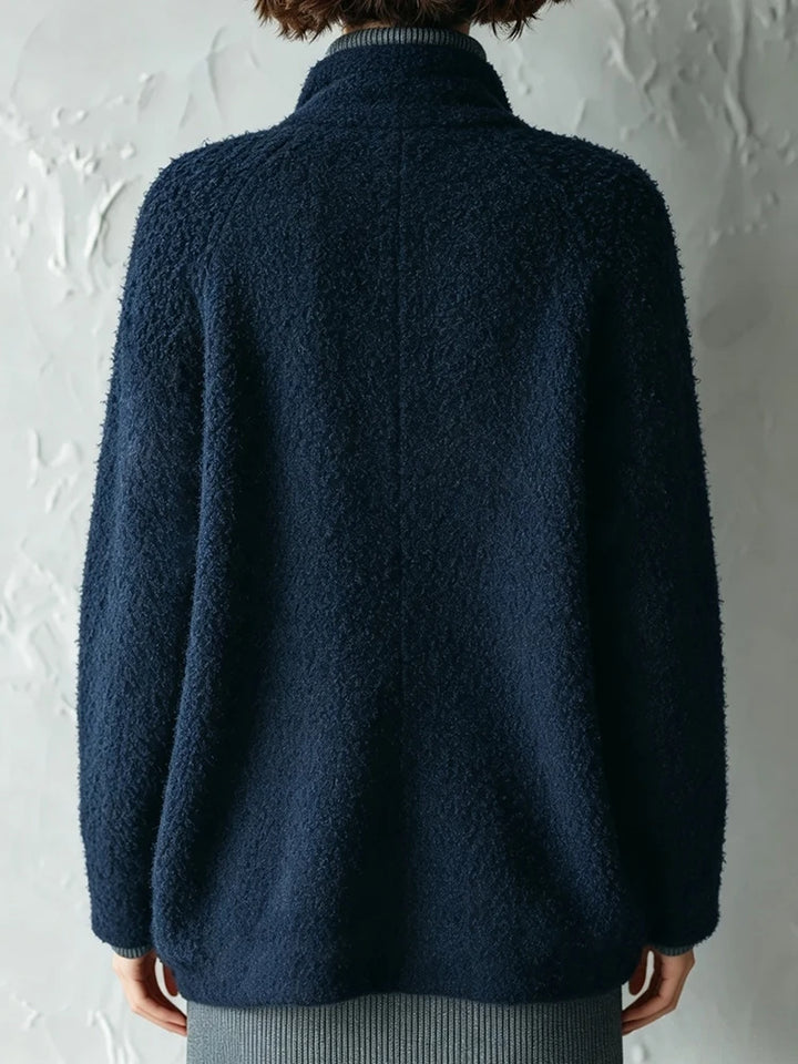 Navy blue bouclé jacket, back view