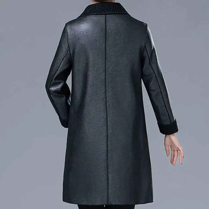 Black faux leather jacket with shearling cuffs, back view